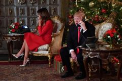 Silent since news of Trump payoff to porn star, Melania skips Davos trip
