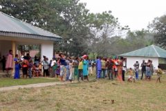 A still image taken from a video shows Cameroonian refugees standing outside a center in Agbokim Waterfalls village Cross River State decries influx of Southern Cameroons refugees