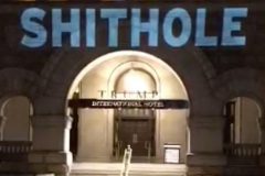 Trump Shithole Hotel ‘Shithole’ projected on Trump Hotel in Washington DC