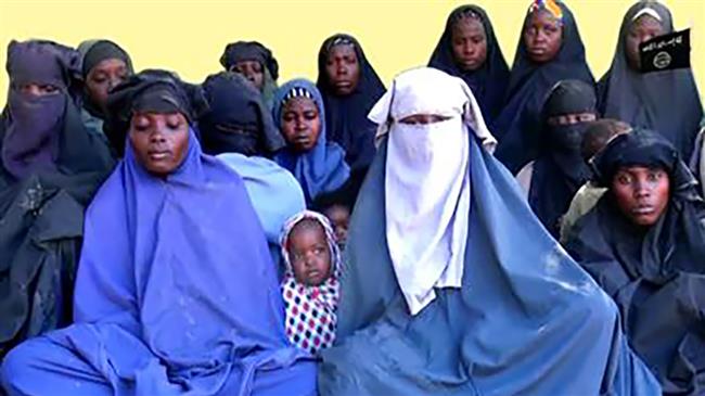Over 100 schoolgirls missing after Boko Haram raid on Nigerian village
