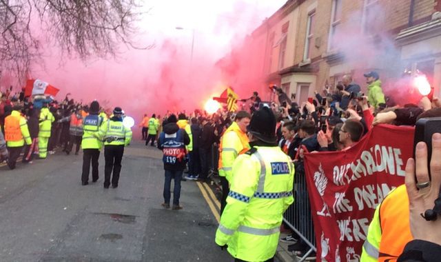 Liverpool fans bombard Man City bus with bottles