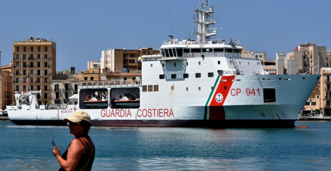 Italy lets migrant ship dock, but fate of passengers unclear