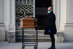 italy-funeral-coronavirus New limits on travel as world comes to grips with second Covid-19 wave