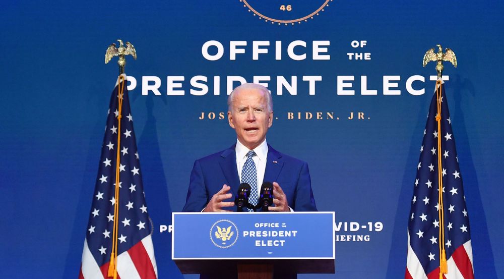 US: Biden promises 100m vaccines for US in first 100 days and vows to reopen schools