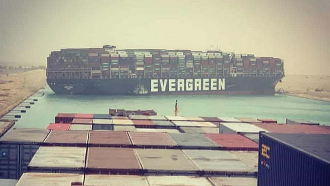 Massive cargo ship turns sideways in Suez Canal, blocking all traffic