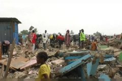 Douala demolition French Cameroun police tear gas residents fighting eviction near Douala airport