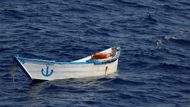 At least 57 Europe-bound migrants drown after boat capsizes off coast of Libya