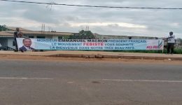 Franck Biya Posters: More than a dozen arrests after Macron visit
