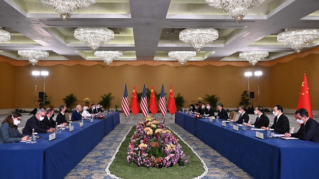 Biden tries to ‘manage differences’ with Xi in first face-to-face meeting as president