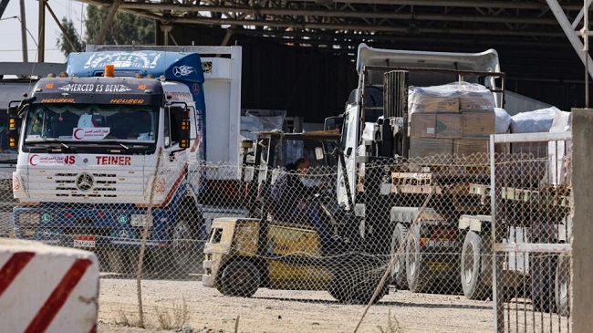 First of 20 aid trucks enter besieged Gaza from Egypt
