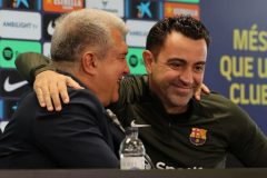 Football: Xavi to remain as Barcelona coach